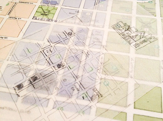 Sketching out map ideas, venue buildings, and mapping out the downtown grid.